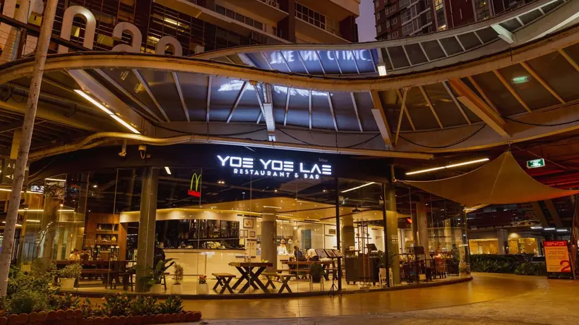 Yoe Yoe Lae Bang Na at night, under the curved roof of The Coast.